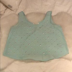 Turquoise tank with silver dots